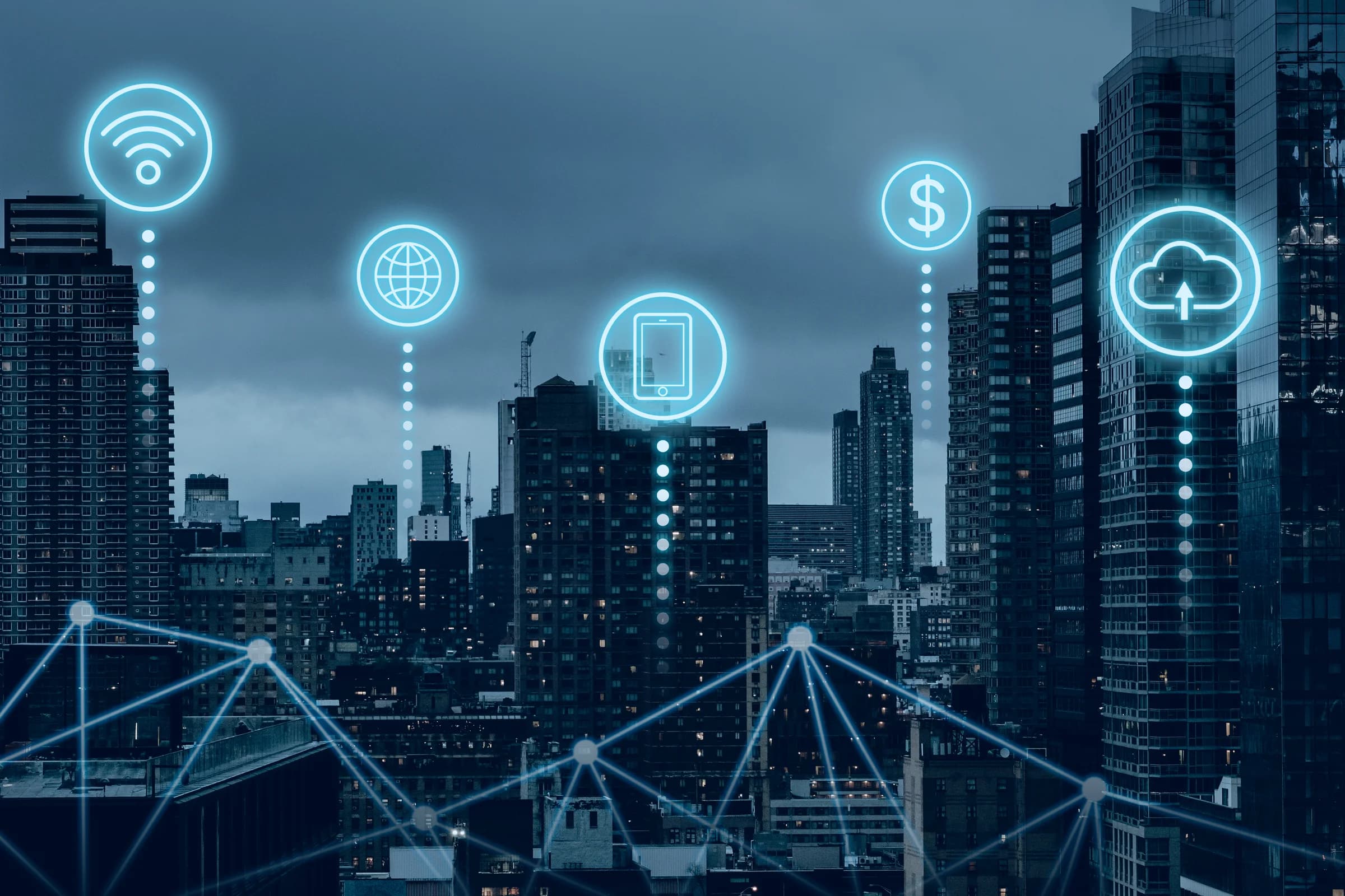 Prédios de uma cidade conectados por linhas de rede, com ícones de tecnologia acima deles